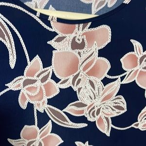 Blue blouse with pink/cream flowers